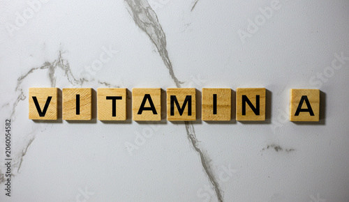 Konstfotografi Vitamin A Word on Wooden Letter Blocks on Marble Background, Nutrition Health Su