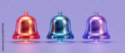 Three iridescent bells in red, blue, and purple colors on a light purple background.
