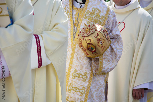 Φωτογραφία Orthodox clergy wearing vestment holding mitre during ceremony