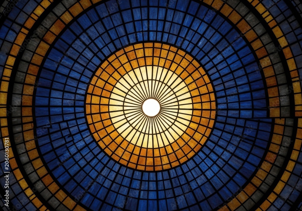 Naklejka premium Circular stained glass dome with radial pattern and central skylight in architectural interior