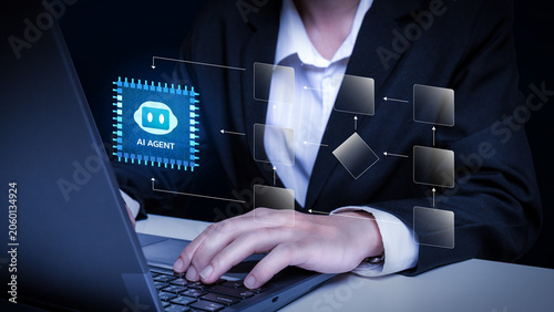 AI Agent at Work: A professional in a suit operates a laptop, with a glowing AI agent icon and a flowchart superimposed, symbolizing advanced technology and intelligent systems.
