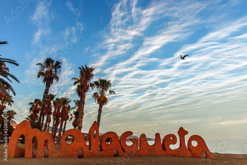 Colorful landscape of the southern coast on the background of magnificent sunset sky, Malaga, Spain