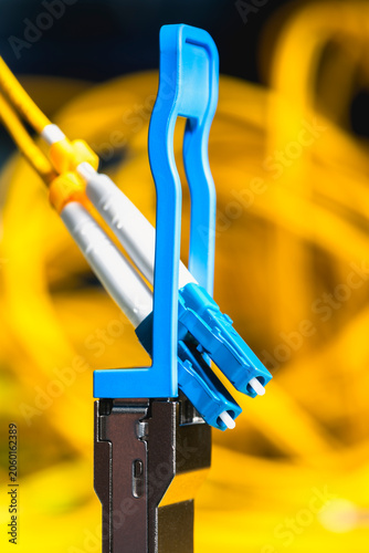 Gigabit Interface Converter, transceiver module connected to a fiber optic patch cord, telecommunications network components used in optical data transmission systems and IT infrastructure