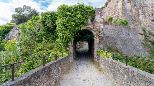 Schilderij op canvas Ancient stone entrance gate on the seafront of the Priamar fortress, Savona, Liguria province, Italy