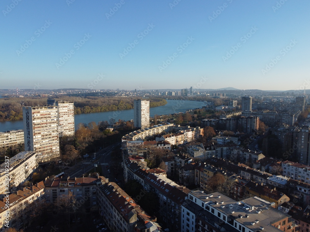 Obraz premium Drone view of sunset above New Belgrade and Zemum districts, Serbia, Europe. 4K.