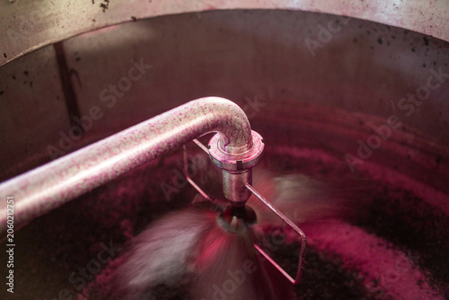 Red Wine Must Being Pumped Over in Stainless Steel Fermentation Tank
