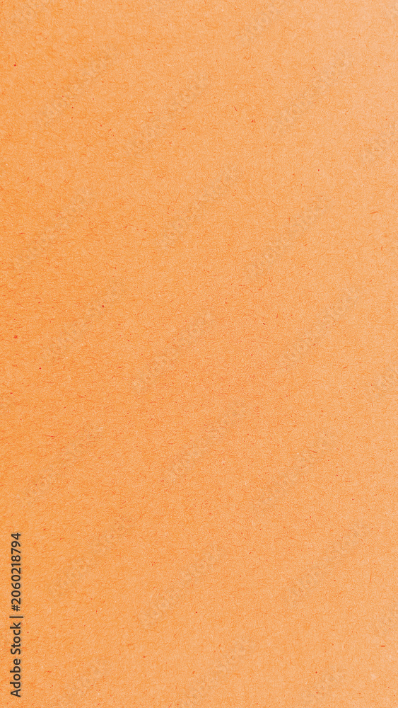 Fototapeta premium Warm textured orange background wallpaper for mobile