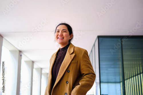 Photography Asian woman smiling outdoors having genuine happiness