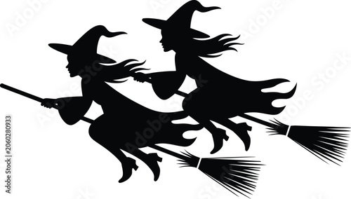 Canvas Print Two witches silhouettes flying on broomsticks through dark night sky for spooky halloween greeting