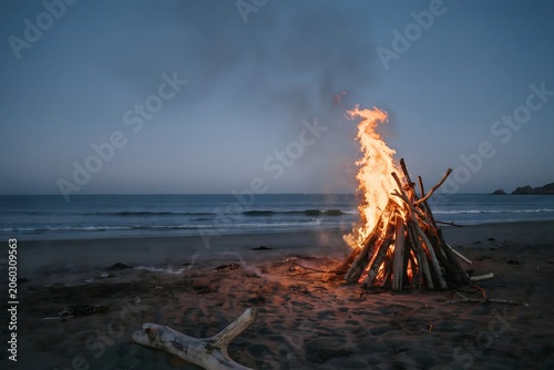 Bonfire on the beach at sunset