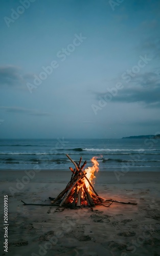 Bonfire on the beach at sunset