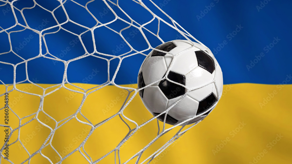 Naklejka premium Soccer Ball Hitting Goal Net Against Blue and Yellow Flag Background, Sports Win Concept
