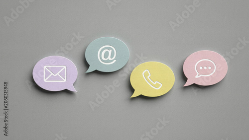 Colorful Paper Cut Speech Bubbles with Email, Phone, and Chat Icons for Communication