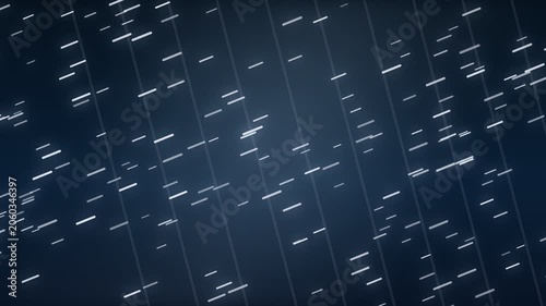 Stars move across a night sky in a dark setting