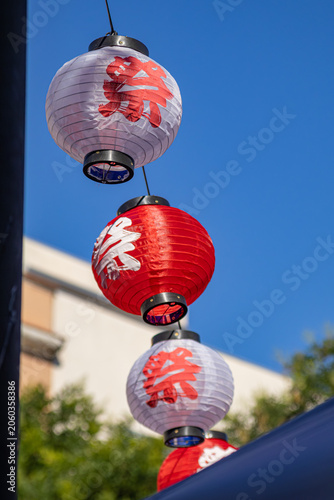 Japanese Festival Lanterns Red White Paper Lanterns Matsuri Decoration Hanging Outdoors Against Blue Sky