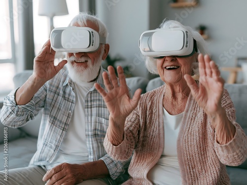 Happy senior citizens using virtual reality headsets at home
