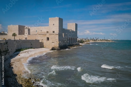 Photos The massive fortress on the coast of the Adriatic Sea, Svevo Castle or  Trani Ca
