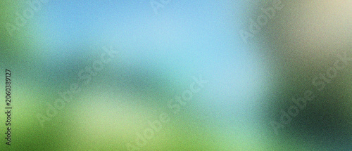 Cuadro en lienzo Abstract blurred nature background with grainy texture and soft bokeh, ethereal green and blue gradient landscape backdrop, artistic out of focus summer garden scene for web design projects
