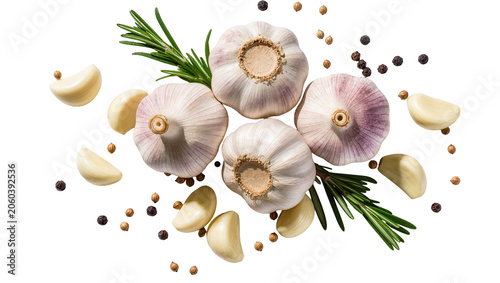 Slika na platnu Whole garlic bulbs and cloves with rosemary sprigs and peppercorns, isolated on
