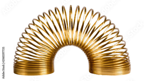 Foto Shiny golden slinky toy forming a perfect arc, isolated on transparent backgroun