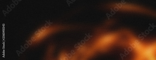 Orange glowing light streaks with grainy texture effect creating soft blurred curves on black background artistic composition for modern digital art graphic design work.