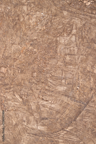 Dusty scratched plywood surface as rustic background