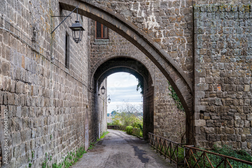 Obraz na plátně Ancient medieval arches along the city walls in Viterbo, Italy.
