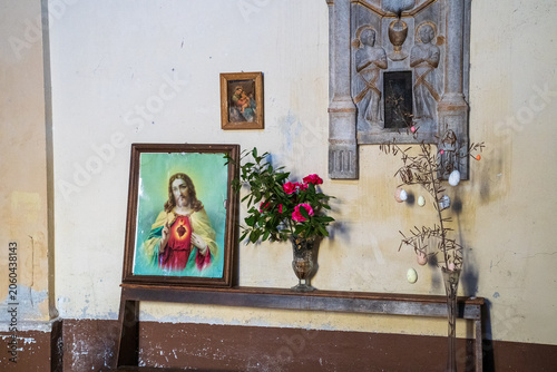 Fényképezés Private devotional corner with Sacred Heart image and Easter decorations, Italy