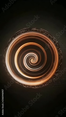 Glowing golden spiral light pattern swirling in dark textured background with motion blur effect creating hypnotic circular design