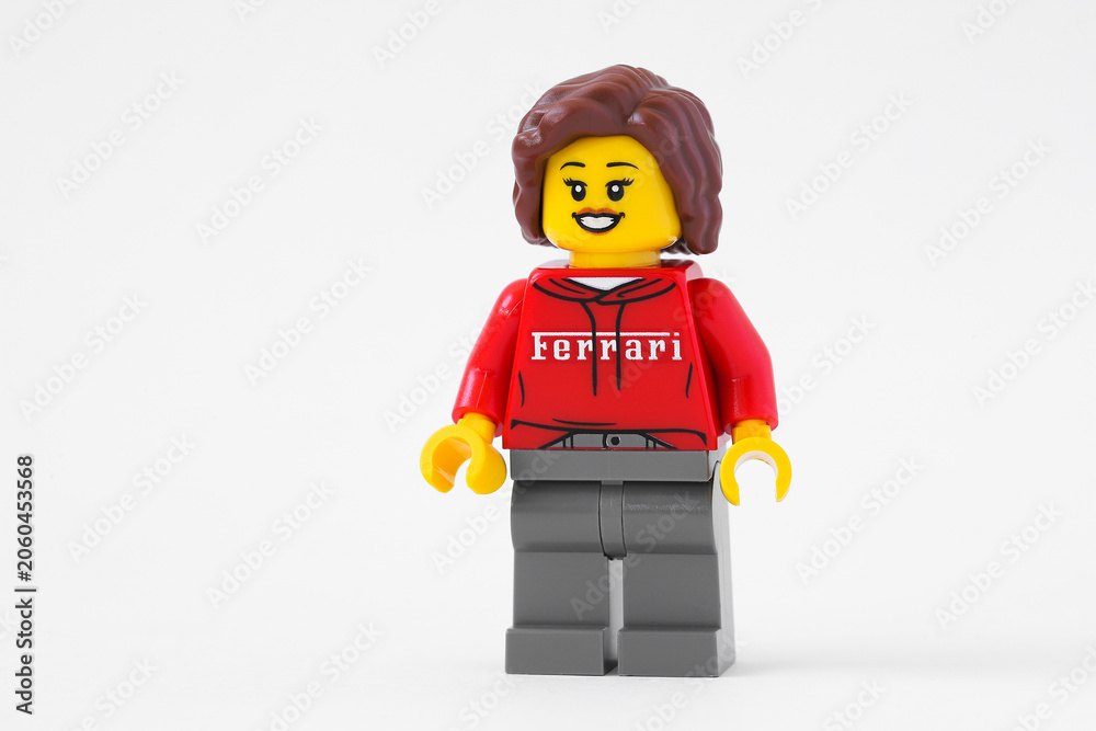 Naklejka premium Kyiv, Ukraine - june 13, 2026: Lego Ferrari woman driver minifigure