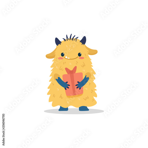 Cute yellow cartoon monster holding a gift box isolated on white background. Vector illustration 