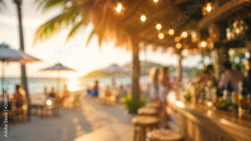blurred view of people relaxing at a tropical beach bar during golden hour. Vacation atmosphere with sunset lighting, palm tree, and ocean scenery. Leisure travel and summer holiday concept
