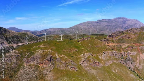 Wind energy clean power landscape. Windmill turbines in mountain landscape