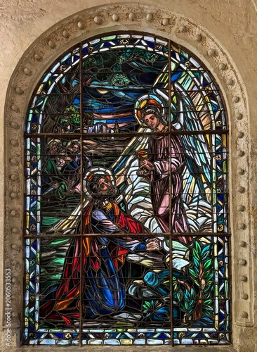 Slika na platnu Vibrant, inspirational, Cathedral, stained glass depiction of Jesus in the Garde