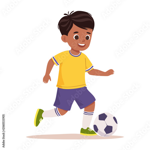 Young boy playing soccer in yellow shirt and blue shorts