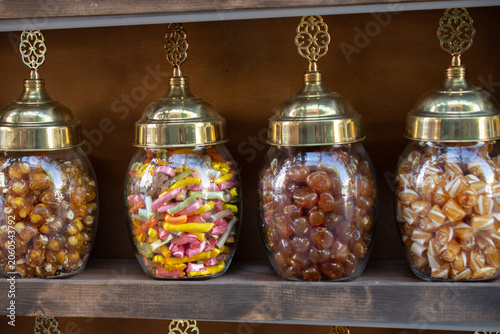 Jars with different delicious candies