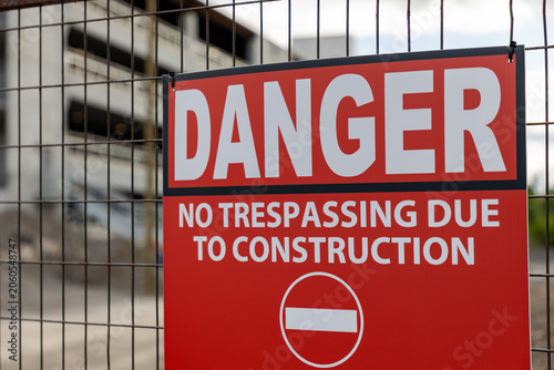 Photos Danger no trespassing sign on construction site