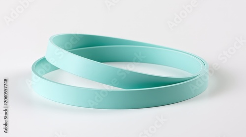 Two flat turquoise bands placed on a white background showing their shape and color clearly for design purposes