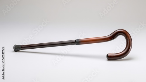Canes are used by people for support while walking and can be made from various materials and designs for comfort