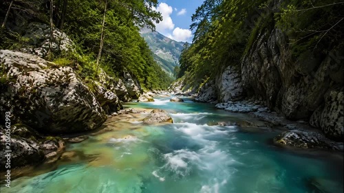 Turquoise River Winding Between Lush Canyon Walls