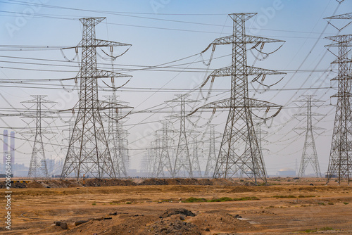 Obraz na plátně High voltage power lines and electricity pylons in the desert of Saudi Arabia