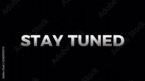 A bold, metallic 'Stay Tuned' message on a stark black background, signaling upcoming content or an important announcement, perfect for video intermissions or digital presentations