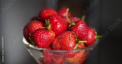 Red ripe strawberries laid out on a dessert plate. Fruit dessert. Natural vitamins.