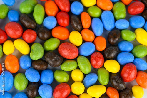 Obraz na plátne Multi coloured coated chocolate peanuts in red,blue,green,orange,yellow and dark