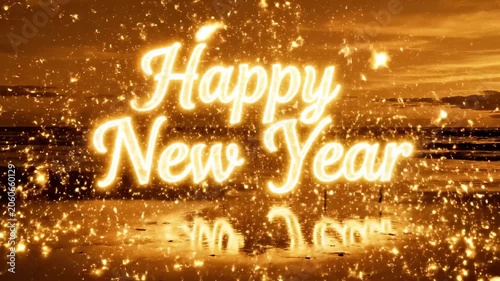 A warm golden-lit beach scene with a festive 'Happy New Year' sparkler display