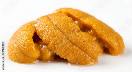Fresh raw sea urchin uni sashimi isolated on white