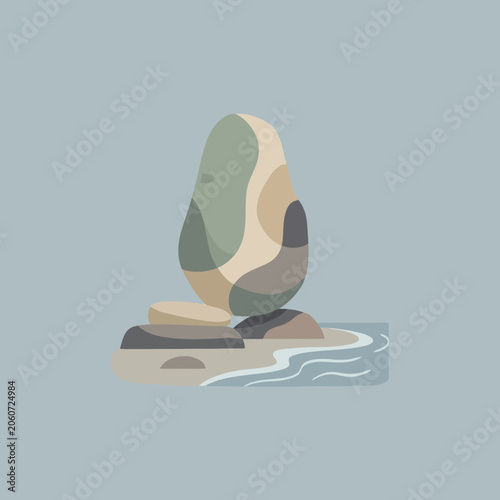 Canvas Print A balanced stack of smooth stones sits by the calm water