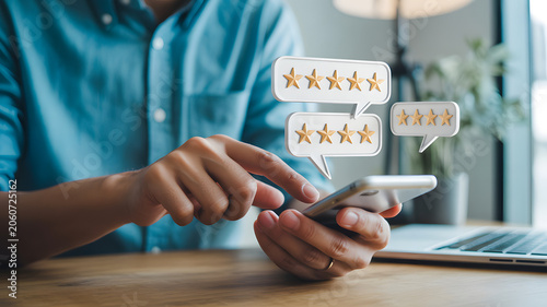 Person giving high rating on mobile phone with speech bubbles and stars