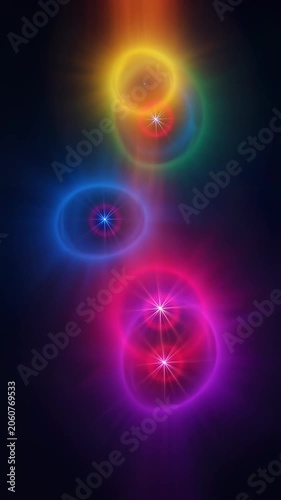 Abstract glowing energy circles with light flares in motion