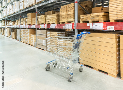 Photography Rows of shelves with boxes in Ikea store in Moscow